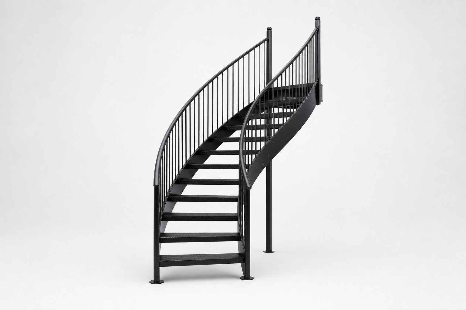 Black metal spiral staircase with a center pole and vertical bar railing.